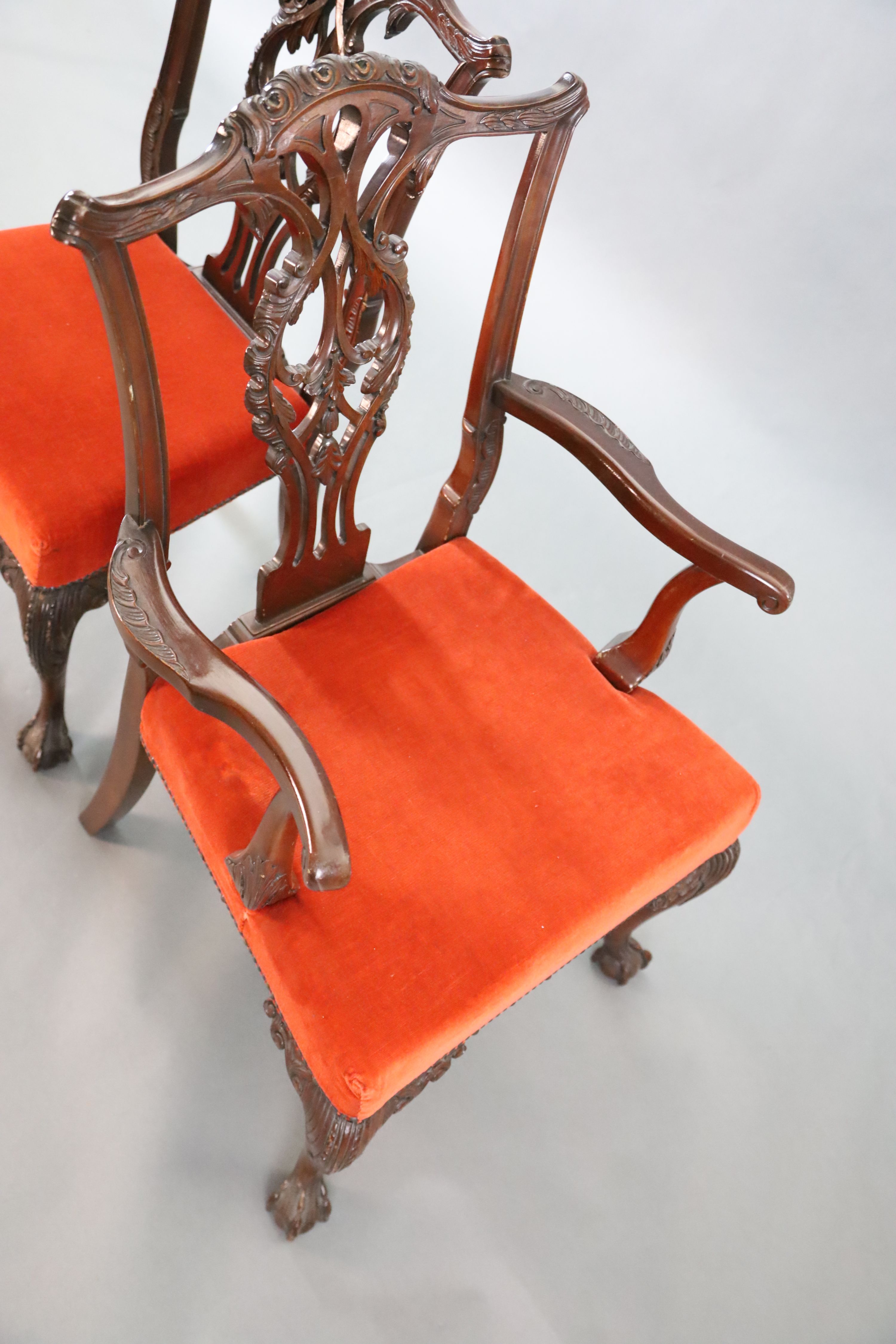A set of eight Chippendale Revival mahogany dining chairs, carvers W.2ft D.2ft H.3ft 4in.